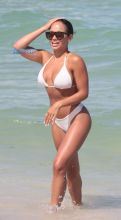 American model Jordan Ozuna wears a white thong bikini at the beach in Miami Beach, FL. Tyga was seen courting Jordan in April on a date in Beverly Hills. SplashNews