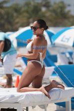 SplashNews American model Jordan Ozuna wears a white thong bikini at the beach in Miami Beach, FL. Tyga was seen courting Jordan in April on a date in Beverly Hills.