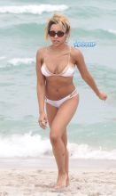Singer Tinashe is seen showing off her curves on the beach in Miami Beach, Picture by: MCCFL / Splash News