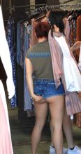 Ariel Winter picks her butt while shopping at Planet Blue in Beverly Hills, CA. Zodiac/ Splash News