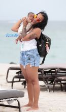 NBA Basketball Player J.R. Smith living with joy the miracle of live with her precious baby daughter Dakota.