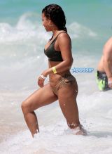 Singer Christina Milian in a bikini at the beach of the Eden Roc hotel in Miami Beach SplashNews
