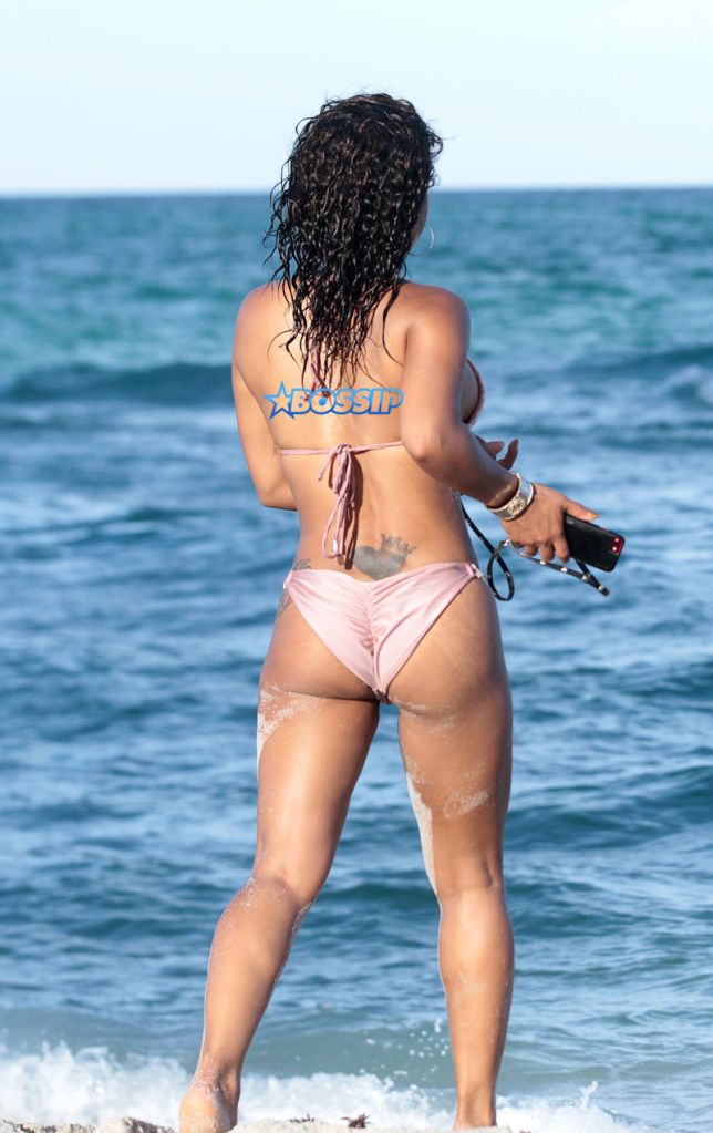 Christina Milian and Karrueche Tran spotted in bikinis at the beach in Miami Beach, Florida. FAMA Press/ Splash News