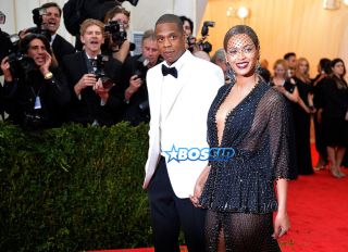 NEW YORK, NY - MAY 05: Jay-Z (L) and Beyonce attend the "Charles James: Beyond Fashion" Costume Institute Gala at the Metropolitan Museum of Art on May 5, 2014 in New York City.