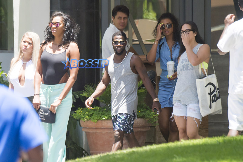 Kevin Hart is seen with a group of female and male friends during his extended party Weekend in Miami. The group were awaited by a convoy of Escalades. 