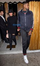 Khloe Kardashian a short black dress, knee high boots and a black hat was NBA Basketball player boyfriend Tristan Thompson 'The Nice Guy' bar in West Hollywood, CA SPW / Splash News