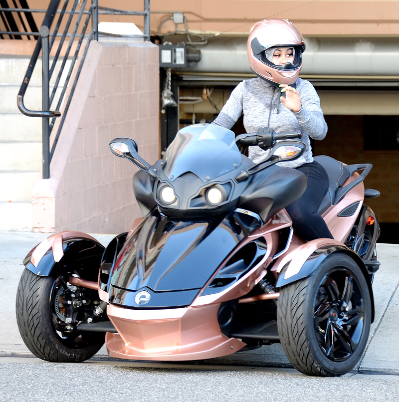 Blac Chyna takes to the road on a pink three-wheeled motorcycle in order to get her eyelashes done at Lashed by Blac Chyna in Los Angeles, USA.