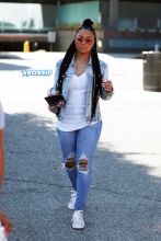 Blac Chyna rocks braids and denim after shopping for jewelry at XIV Karats in Beverly Hills, CA.