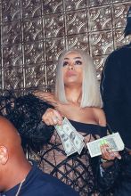 Yo Gotti and Blac Chyna are seen at Ace of Diamonds in West Hollywood, California