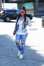 Blac Chyna rocks braids and denim after shopping for jewelry at XIV Karats in Beverly Hills, CA.