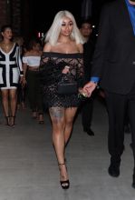 Blac Chyna and Yo Gotti are seen leaving Avenue in Hollywood, California.