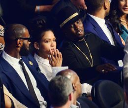 Sean "P Diddy" Combs chats with Lebron James and Patriots owner Robert Kraft as they attend the Mayweather /McGregor fight at the T-Mobile Arena in Las Vegas. Nv