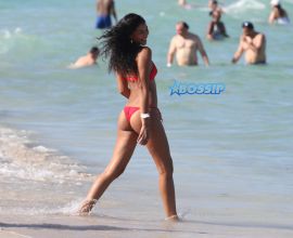 Supermodel Chanel Iman and boyfriend Sterling Shepard get romantic on the beach in Miami Beach, FL.
