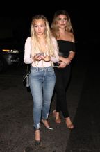 Bachelor in Paradise contestants Corinne Olympios and DeMario Jackson hug and share a passionate kiss with one another at the Nightingale club in West Hollywood. They arrived to the club at 11:30 P.M. They both came outside to say goodbye to each other. Corinne left with her friend while DeMario left by himself.