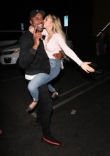 Bachelor in Paradise contestants Corinne Olympios and DeMario Jackson hug and share a passionate kiss with one another at the Nightingale club in West Hollywood. They arrived to the club at 11:30 P.M. They both came outside to say goodbye to each other. Corinne left with her friend while DeMario left by himself.