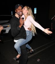 Bachelor in Paradise contestants Corinne Olympios and DeMario Jackson hug and share a passionate kiss with one another at the Nightingale club in West Hollywood. They arrived to the club at 11:30 P.M. They both came outside to say goodbye to each other. Corinne left with her friend while DeMario left by himself.