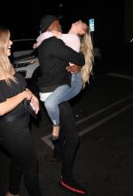Bachelor in Paradise contestants Corinne Olympios and DeMario Jackson hug and share a passionate kiss with one another at the Nightingale club in West Hollywood. They arrived to the club at 11:30 P.M. They both came outside to say goodbye to each other. Corinne left with her friend while DeMario left by himself.