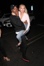 Bachelor in Paradise contestants Corinne Olympios and DeMario Jackson hug and share a passionate kiss with one another at the Nightingale club in West Hollywood. They arrived to the club at 11:30 P.M. They both came outside to say goodbye to each other. Corinne left with her friend while DeMario left by himself.