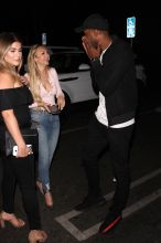 Bachelor in Paradise contestants Corinne Olympios and DeMario Jackson hug and share a passionate kiss with one another at the Nightingale club in West Hollywood. They arrived to the club at 11:30 P.M. They both came outside to say goodbye to each other. Corinne left with her friend while DeMario left by himself.