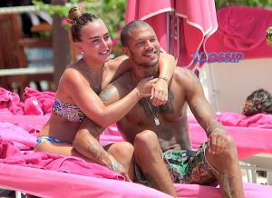 Hot Felon Jeremy Meeks t on the beach with his girlfriend, Topshop Heiress, Chloe Green. The couple packed on the PDA as they sat near the ocean in Barbados. jet ski, shower