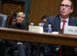 UNITED STATES - JANUARY 19: Louise Linton, fiancée of Steven Mnuchin, right, President-elect Trump's nominee for Treasury secretary, attends his Senate Finance Committee confirmation hearing in Dirksen Building, January 19, 2017.