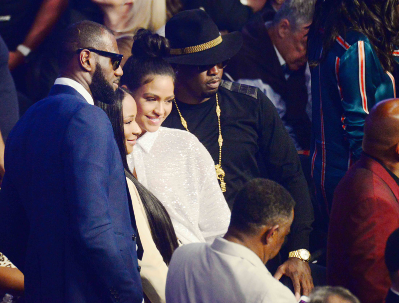 Sean "P Diddy" Combs chats with Lebron James and Patriots owner Robert Kraft as they attend the Mayweather /McGregor fight at the T-Mobile Arena in Las Vegas. Nv