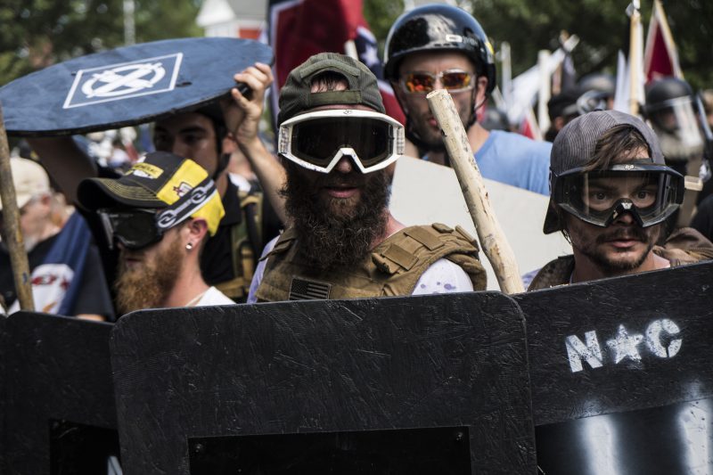 Alt-right rally members crash with counter protesters in Lee Park in Charlottesville. Alt-right group and white supremest members gathered and formed a big rally in Lee Park.