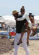 Comedian Steve Harvey relaxes with his wife Marjorie Bridges Woods on holiday in Club 55 in Saint-Tropez, France.