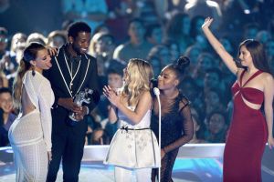 INGLEWOOD, CA - AUGUST 27: Gucci Mane (2nd from L, holding award) and (from L) Dinah Jane, Ally Brooke, Normani Kordei, and Lauren Jauregui of music group Fifth Harmony accept the Best Pop Video award for 'Down' onstage during the 2017 MTV Video Music Awards at The Forum on August 27, 2017 in Inglewood, California.