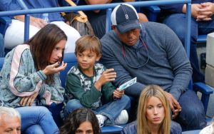 Tiger Woods and son Charlie Axel Woods watch the 2017 US Open Men's Championships at Arthur Ashe Stadium in Flushing, New York, USA.