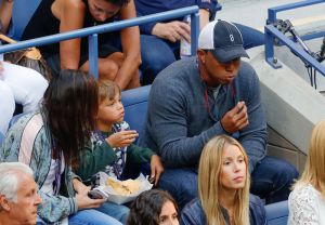 Tiger Woods and son Charlie Axel Woods watch the 2017 US Open Men's Championships at Arthur Ashe Stadium in Flushing, New York, USA.
