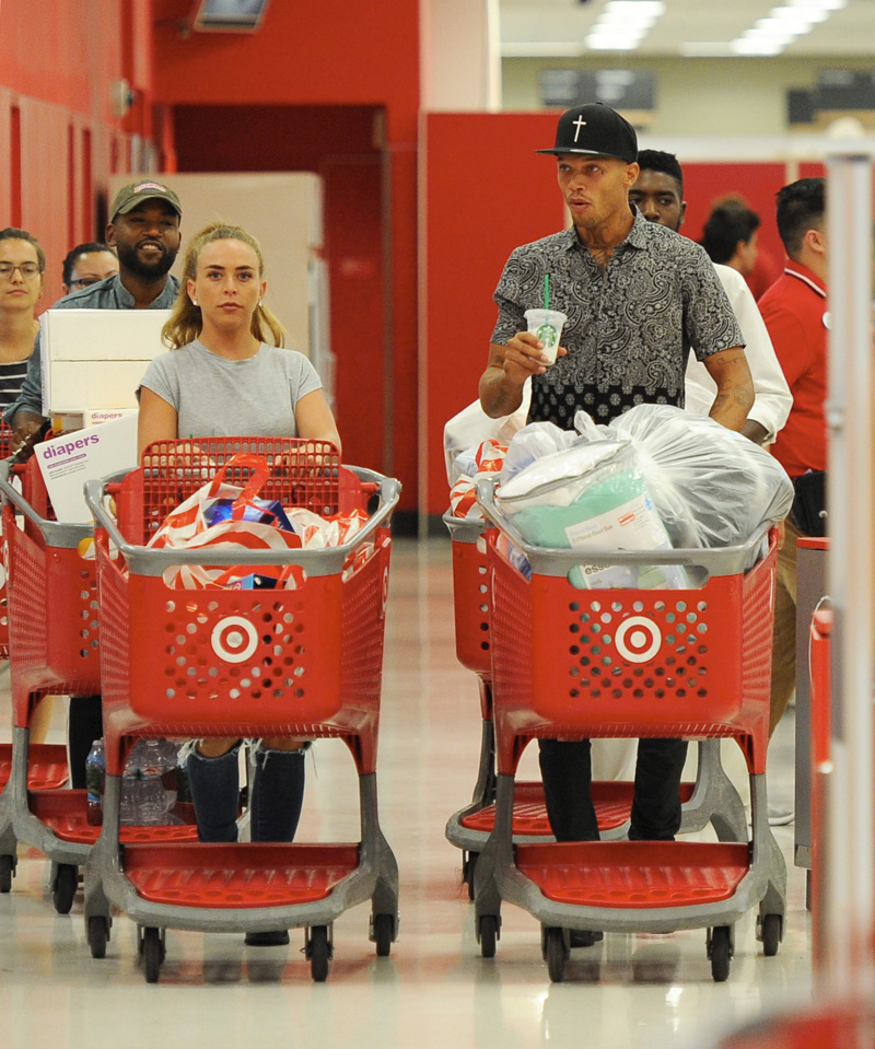 Model Jeremy Meeks and fiancee Chloe Green buying 4 cartloads of goodies at Target for Hurricane Harvey relief. Chloe was seen wearing her new engagement ring while going to a Hurricane Harvey donations party in Los Angeles, California.