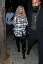 Blac Chyna gets escorted to her car as she parties at the newly opened club The Diamond District in Hollywood