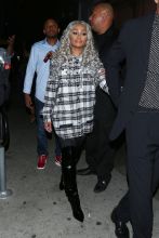 Blac Chyna gets escorted to her car as she parties at the newly opened club The Diamond District in Hollywood