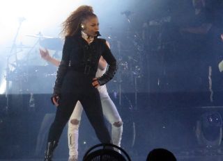 Janet Jackson looking back in shape in a variety of tight outfits after giving birth several months ago as she performs the opening night of her State Of The World tour at the Cajundome in Lafayette, LA after postponing her Unbreakable Tour in 2016 to start a family