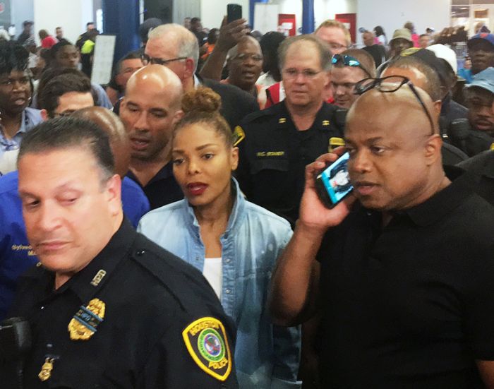 Singer Janet Jackson and brother Randy Jackson (R) visit displaced people at the temporary shelter at George R. Brown convention center in Houston, Texas, U.S. September 8, 2017.