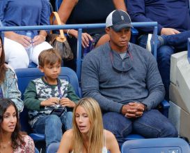 Tiger Woods and son Charlie Axel Woods watch the 2017 US Open Men's Championships at Arthur Ashe Stadium in Flushing, New York, USA.