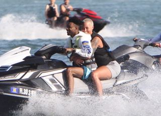 Actress and model Amber Rose and boyfriend 21 Savage ride a jet ski on Miami Beach, Florida.