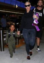 Amber Rose and son Sebastian Taylor Thomaz arriving at the Los Angeles International Airport.