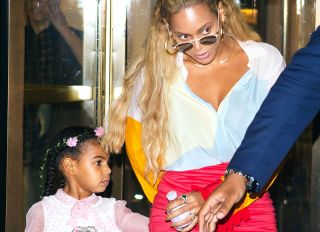 BeyoncÈ Knowles and Blue Ivy Carter go shopping at Bergdorf Goodman in colorful outfits in New York.