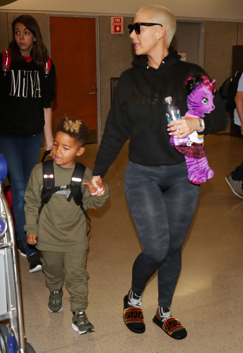 Amber Rose and son Sebastian Taylor Thomaz arriving at the Los Angeles International Airport.