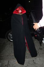 Jermaine Dupri wears a mask and a black robe with a hoodie as his costume as he goes to Kelly Rowland's Halloween party held at the Poppy club in West Hollywood
