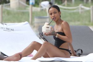 Karrueche Tran black bikini beach day with friends in Miami day after hosting the TV wedding from Gucci Mane and Keyshia Ka'Oir