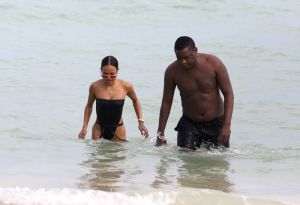 Karrueche Tran black bikini beach day with friends in Miami day after hosting the TV wedding from Gucci Mane and Keyshia Ka'Oir