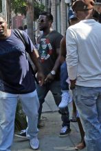 Kevin Hart and heavily pregnant Eniko Parrish take Kevin's kids to the Ice Cream Museum in Los Angeles.