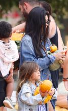 Kourtney Kardashian and children at a pumpkin patch in Los Angeles.