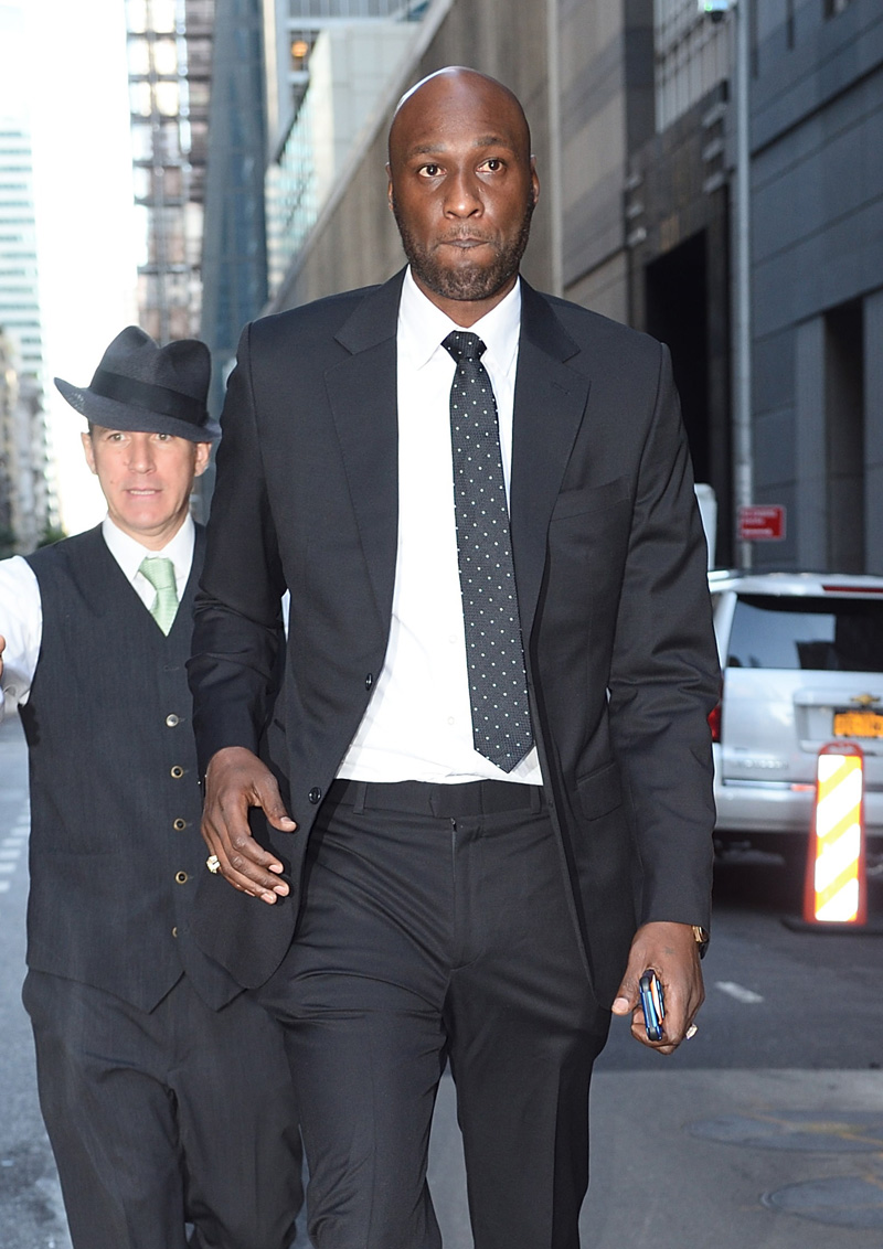  Lamar Odom looked extremely happy and healthy. He stepped out of his Midtown hotel to attend the NYC Basketball Hall of Fame, which he is being inducted into . He had a big smile on his face, and looked back in his glory as he was approached for photos by fans.