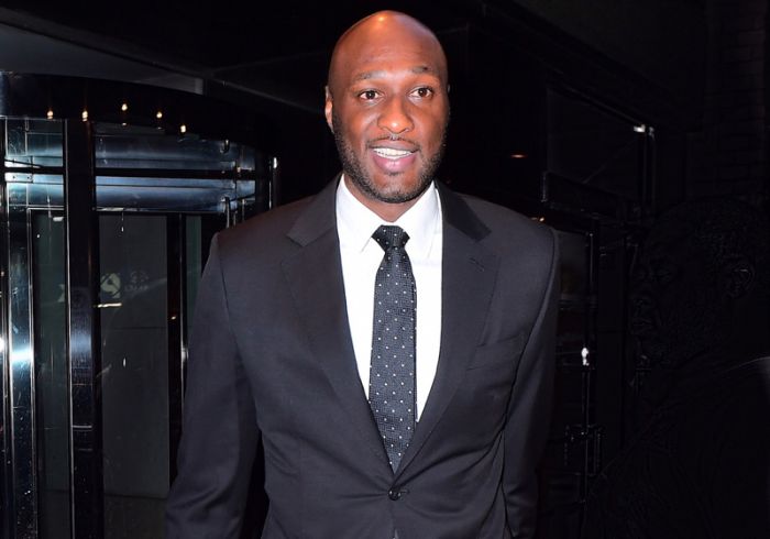 Lamar Odom looked extremely happy and healthy. He stepped out of his Midtown hotel to attend the NYC Basketball Hall of Fame, which he is being inducted into . He had a big smile on his face, and looked back in his glory as he was approached for photos by fans.