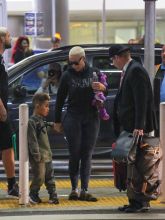 Amber Rose and her son Sebastian are seen at Los Angeles International Airport in Los Angeles, California.
