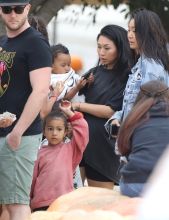 Kourtney Kardashian and children at a pumpkin patch in Los Angeles.